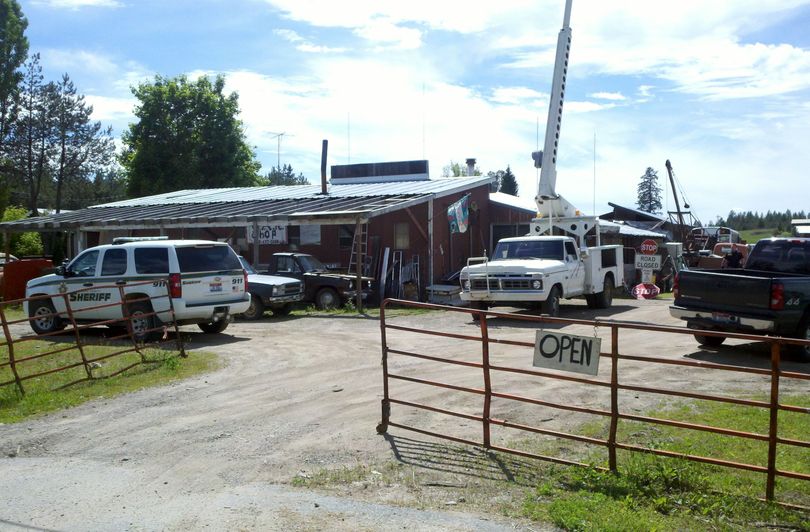 Bonner County investigators search Mr. D's Auto Repair and Salvage Yard on Highway 41, just south of Oldtown, as part of an ongoing car theft and stolen property investigation. (Bonner County Sheriff's Office)