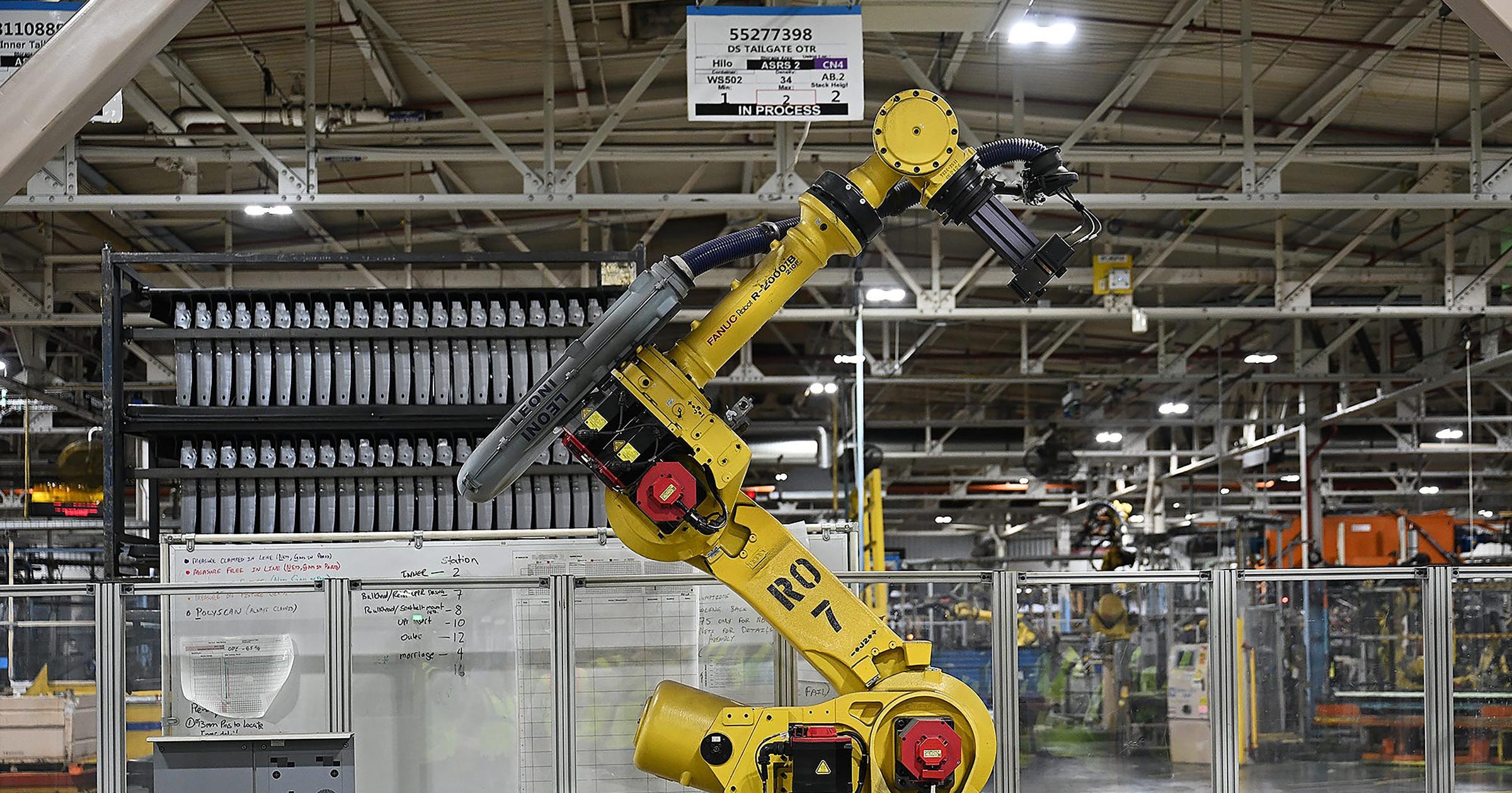 Fast-improving AI, robotics could make 'dark' auto factories a reality