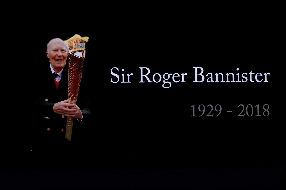 A video screen shows a tribute to Roger Bannister at the World Athletics Indoor Championships in Birmingham, Britain, Sunday, March 4, 2018. Bannister, the first person to run a mile in under four minutes, died March 3. (Matt Dunham / Associated Press)