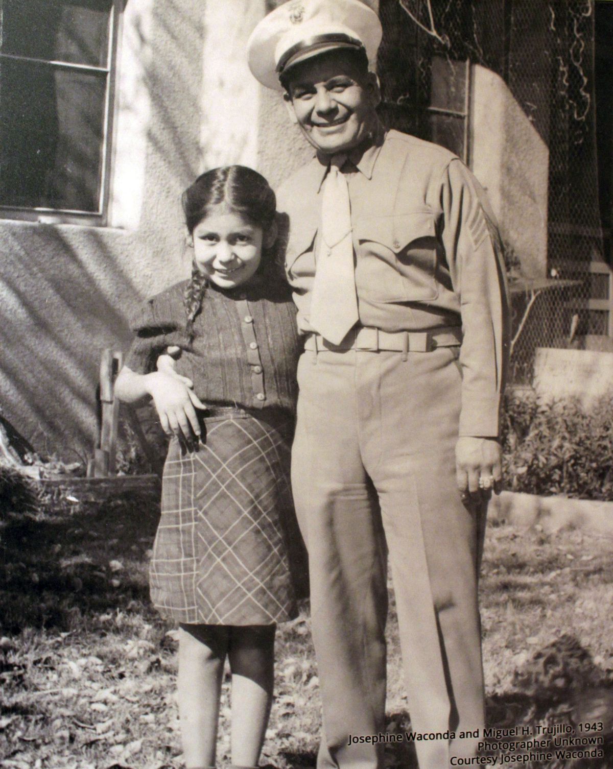 A photograph of Miguel Trujillo of Isleta Pueblo and his daughter that is on display at the exhibit. Trujillo fought in 1948 for the right of American Indians to vote in New Mexico. (Associated Press)