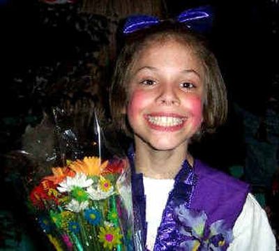 
Maddie Schafer is all smiles following a school play last spring. Maddie spent her 10th birthday in the pediatric intensive care unit at Sacred Heart Children's Hospital, where she remains in a drug-induced coma while being treated for seizures. 
 (Photo courtesy of family. / The Spokesman-Review)