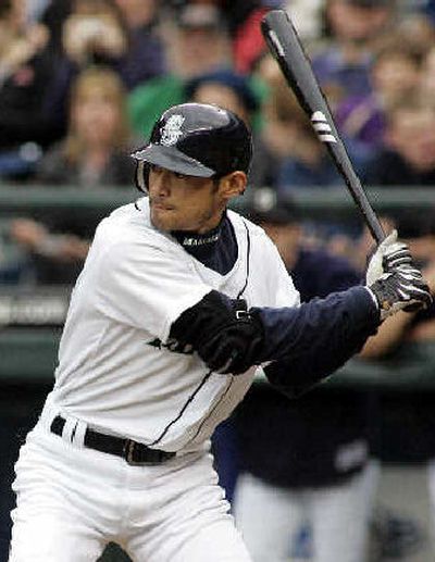 
Seattle's Ichiro Suzuki zeroes in on his 1,000th career hit in the first inning Tuesday.
 (Associated Press / The Spokesman-Review)