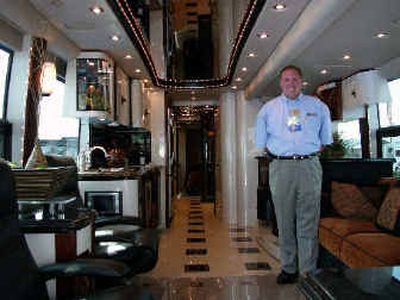 
Brian Griffitt, sales manager for Buddy Gregg Motor Homes in Dallas, stands inside a $1.5 million motor coach on Wednesday at the Family Motor Coach Association's convention in Perry, Ga. He brought six motor homes to the show worth a total of $8.5 million. 
 (Associated Press / The Spokesman-Review)