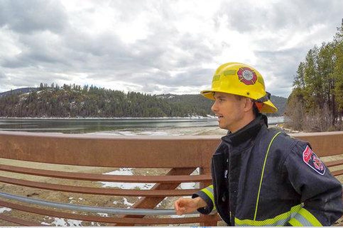 Gwen LeTutour trains in full firefighting gear. LeTutour and his wife Katie Adams, decided to raise money for cancer awareness by running 100 miles in full firefighting gear. (Plant Positive / Courtesy)