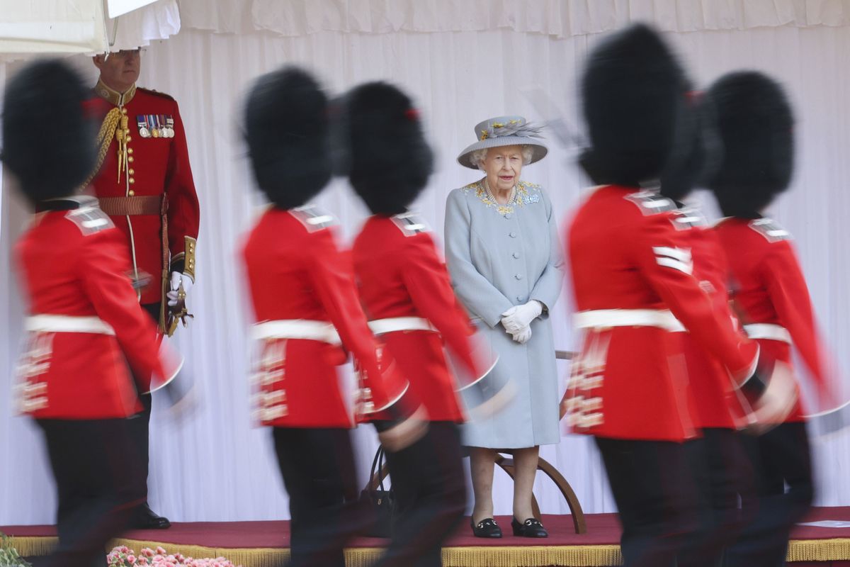 Britain’s Queen Elizabeth II watches a ceremony to mark her official birthday Saturday at Windsor Castle.  (Chris Jackson)