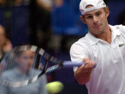 
Andy Roddick returns the ball to France's Fabrice Santoro during the Lyon Grand Prix Saturday in Lyon, France. 
 (Associated Press / The Spokesman-Review)