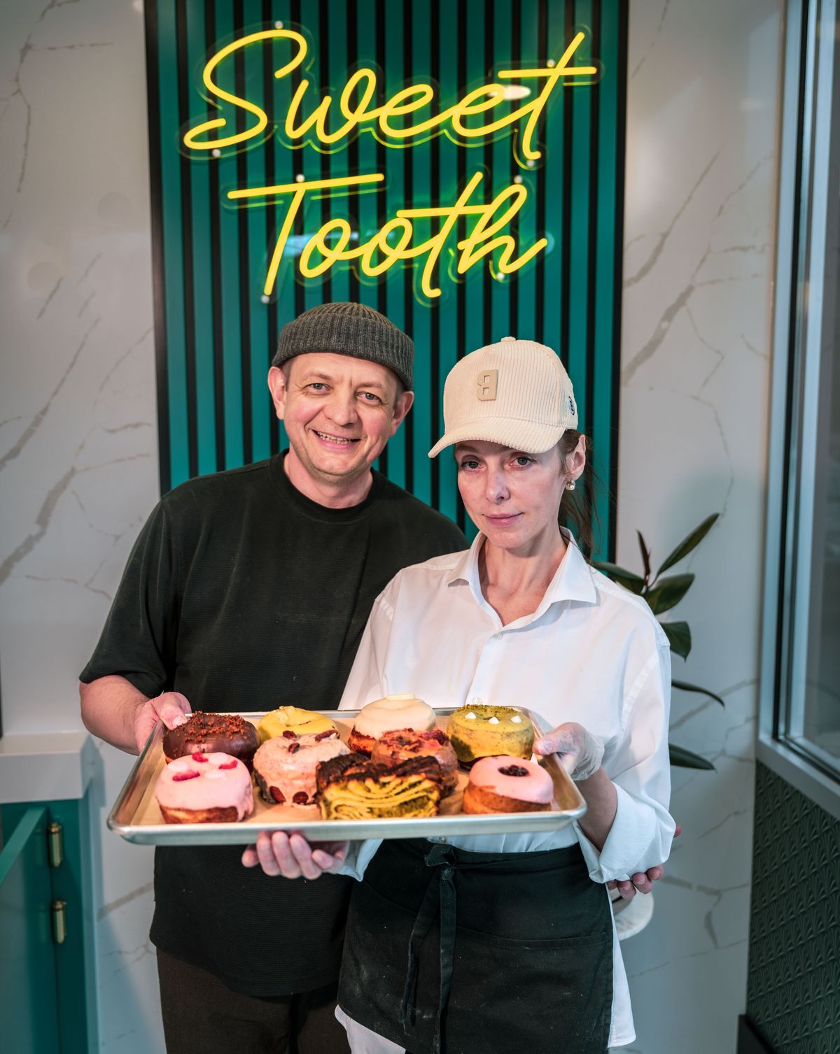 Igor Yorke and his wife Iryna have just opened Sweet Tooth, a doughnut and pastry business on South Grand Avenue in the old Brain Freeze Creamery building.  (COLIN MULVANY/THE SPOKESMAN-REVIEW)