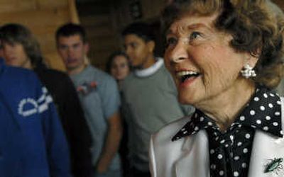 
Edith Schuyler, of Hope, Idaho, smiles as students from Clark Fork High School file into The Dock of The Bay restaurant in Hope on Wednesday. Schuyler donated $500,000 to the school to use as a college scholarship fund. 
 (Kathy Plonka / The Spokesman-Review)