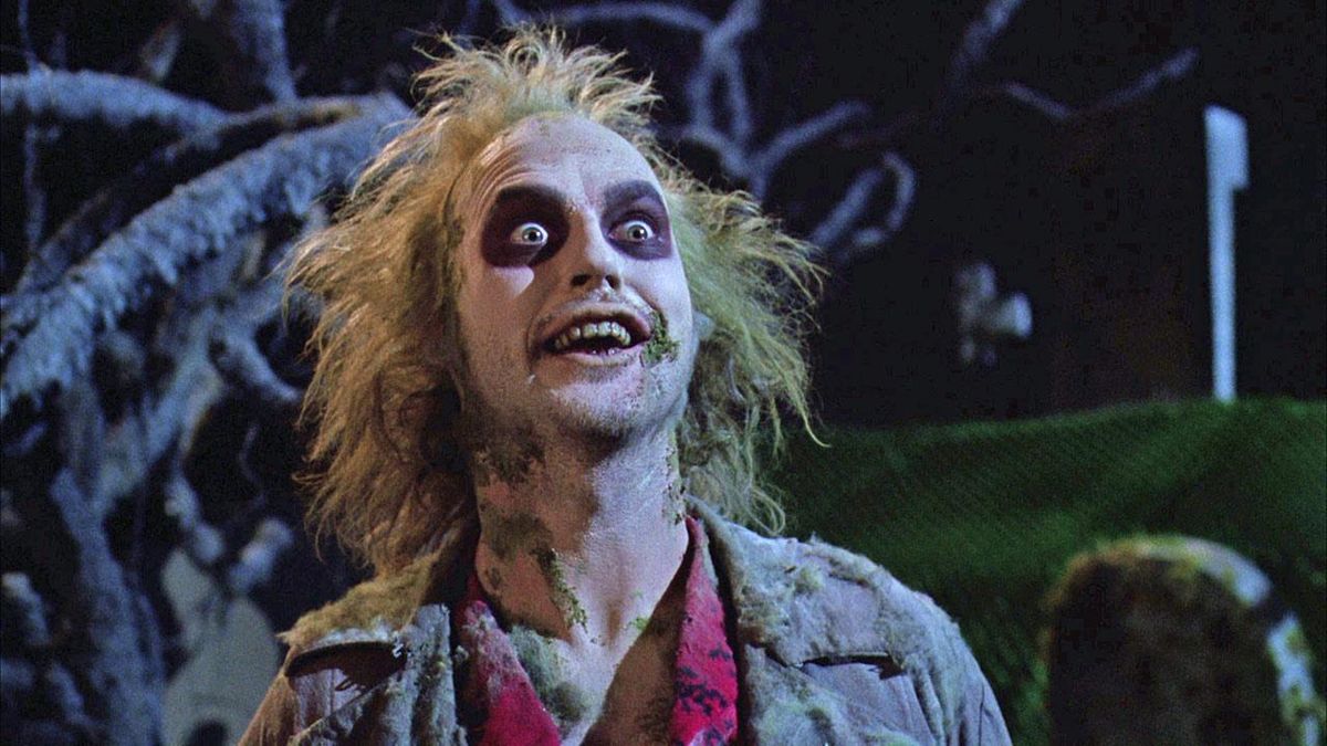 Michael Keaton plays Betelgeuse, a “bio-exorcist” from the Netherworld, in the 1988 Tim Burton comedy “Beetlejuice.”  (Warner Bros.)