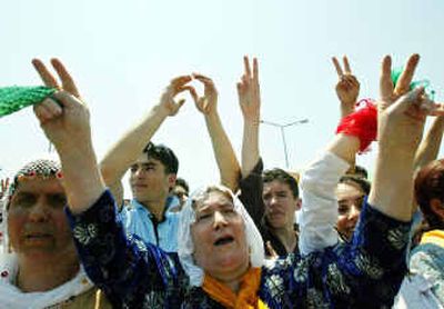 
Thousands of Kurds demonstrate in support of Abdullah Ocalan, jailed leader of an outlawed Kurdish rebel group, during a protest in Istanbul on Sunday. 
 (Associated Press / The Spokesman-Review)