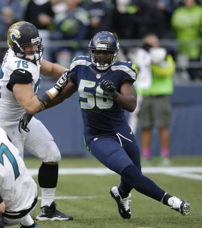 Seattle Seahawks DL Cliff Avril was one of eight players used on the defensive line last week. (Associated Press)
