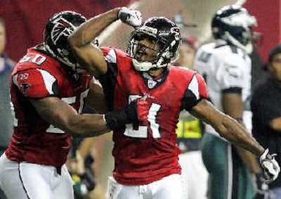 
Atlanta's boosted defense includes DeAngelo Hall, right, and Edgerton Hartwell. 
 (Associated Press / The Spokesman-Review)