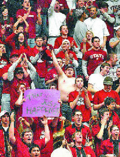 
Washington State's fans will try to cheer the Cougars past Southern California. 
 (Associated Press / The Spokesman-Review)
