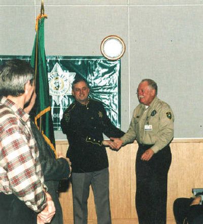 
Ed Jackson is pictured with Mark Sterk when he won the Sheriff's Office Volunteer of the Year award in 2001.
 (Courtesy photo / The Spokesman-Review)