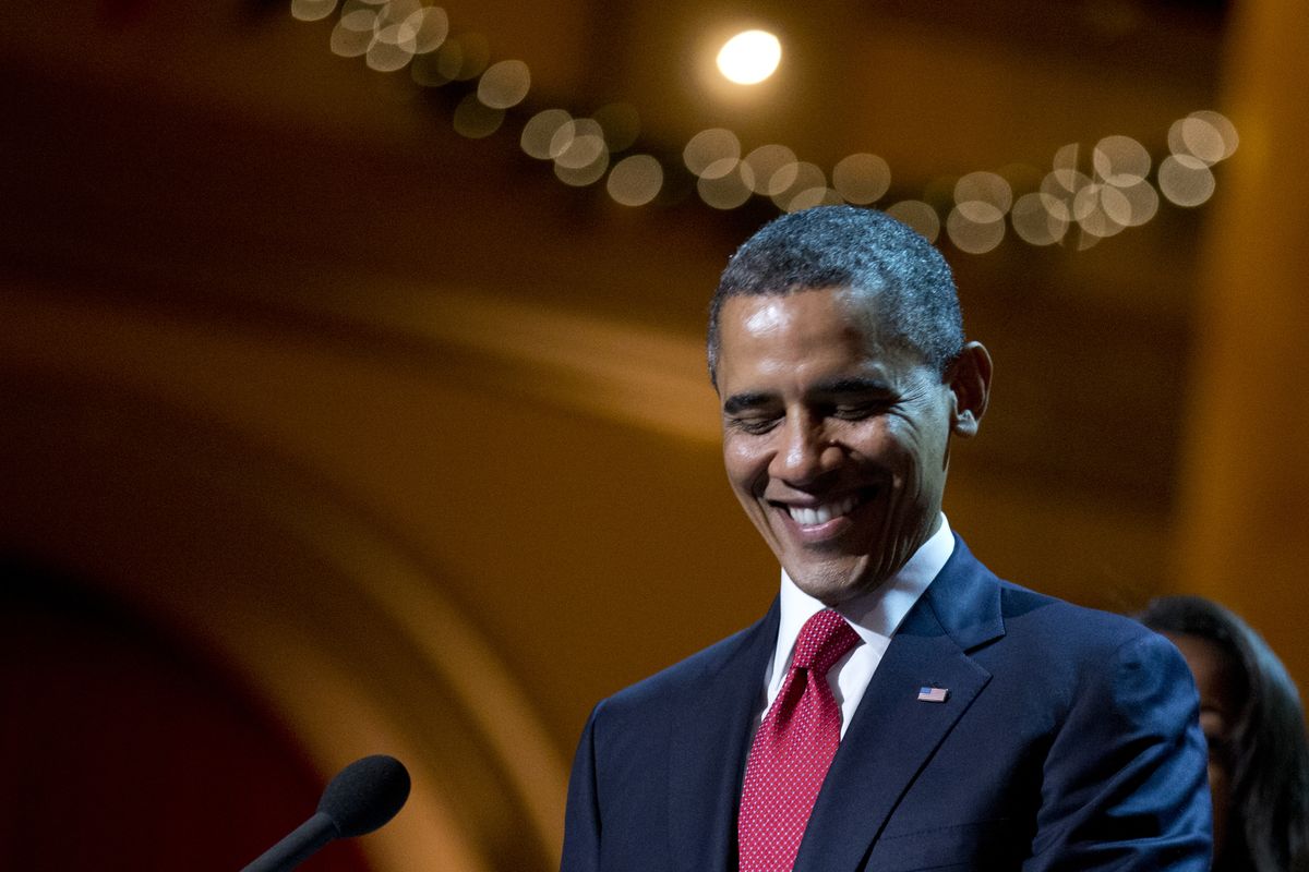 President Barack Obama smiles as he delivers his remarks during the Annual Christmas in Washington presentation at the National Building Museum in Washington, Sunday, Dec. 9, 2012. (Manuel Ceneta / Associated Press)