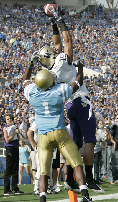 Jermaine Kearse, here catching a TD pass, says UW’s confidence is high.  (Associated Press)