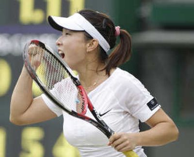 
China's Zheng Jie reacts as she defeats number one seed Ana Ivanovic of Serbia on Friday at Wimbledon. Associated Press
 (Associated Press / The Spokesman-Review)