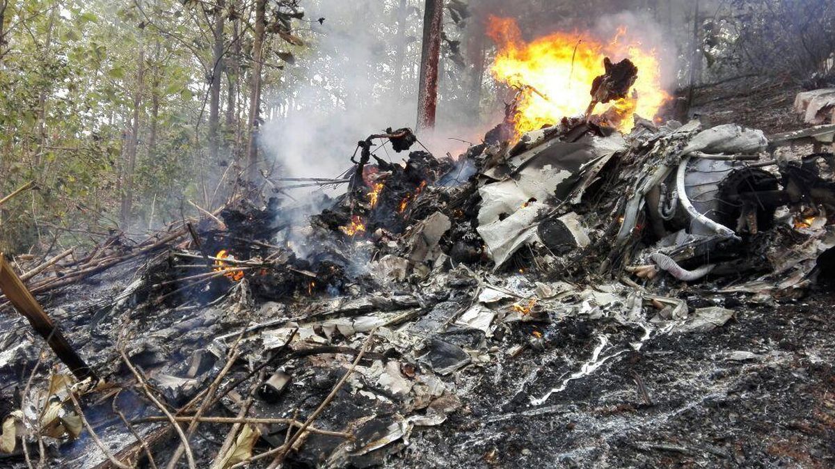 This photo released by Costa Rica’s Civil Aviation press office shows the site of a plane crash in Punta Islita, Guanacaste, Costa Rica, Sunday, Dec. 31, 2017. A government statement says there were 10 foreigners and two Costa Rican crew members aboard the plane belonging to Nature Air, which had taken off nearby. (Associated Press)
