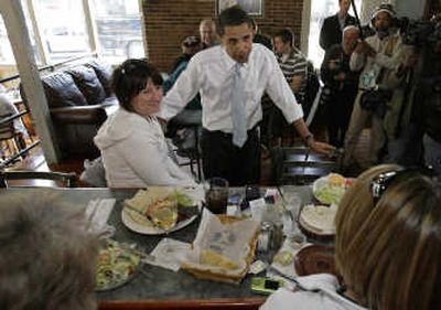 
Barack Obama talks with diners at J.P. Edward's Grill and Bar in Burnham, Pa., on Sunday. Associated Press
 (Associated Press / The Spokesman-Review)