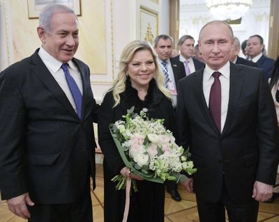 Russian President Vladimir Putin, right, Israeli Prime Minister Benjamin Netanyahu, and his wife Sara pose for a photo after talks in the Kremlin in Moscow, Russia, Wednesday, Feb. 27, 2019. (Alexei Druzhinin / associated press)