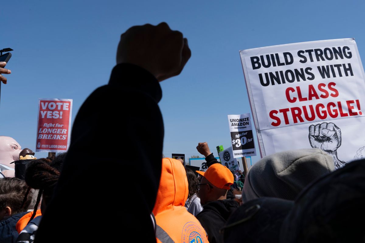 Workers rally in support of unionization in front of the Amazon LDJ-5 warehouse on Staten Island in New York on April 24.  (Calla Kessler/For The Washington Post)
