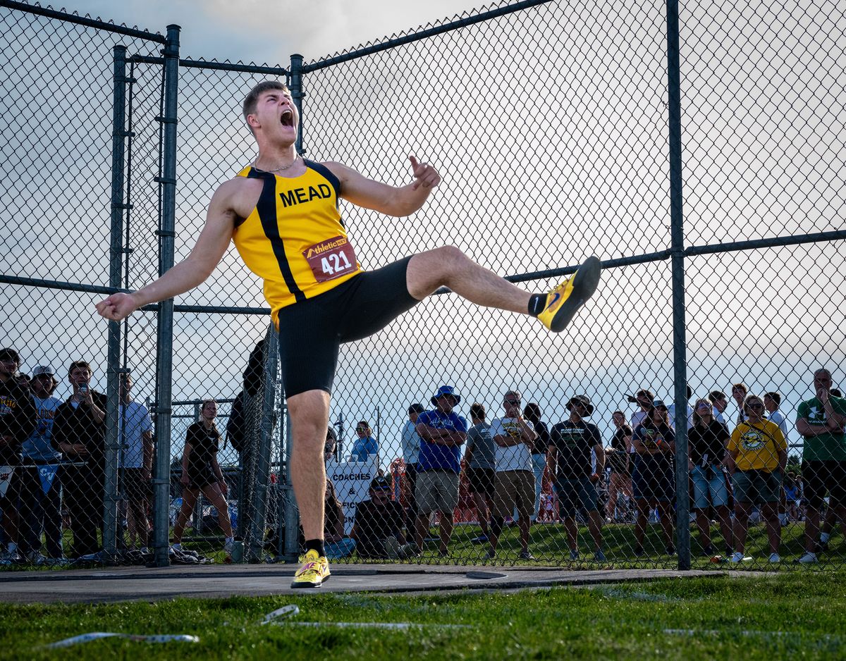 Mead’s Simon Rosselli reacts after a throw during the 4A boys discus event at the 4A/3A District 6 track and field championships on Thursday at Central Valley High School. Rosselli won the event. (Colin Mulvany/The Spokesman-Review)