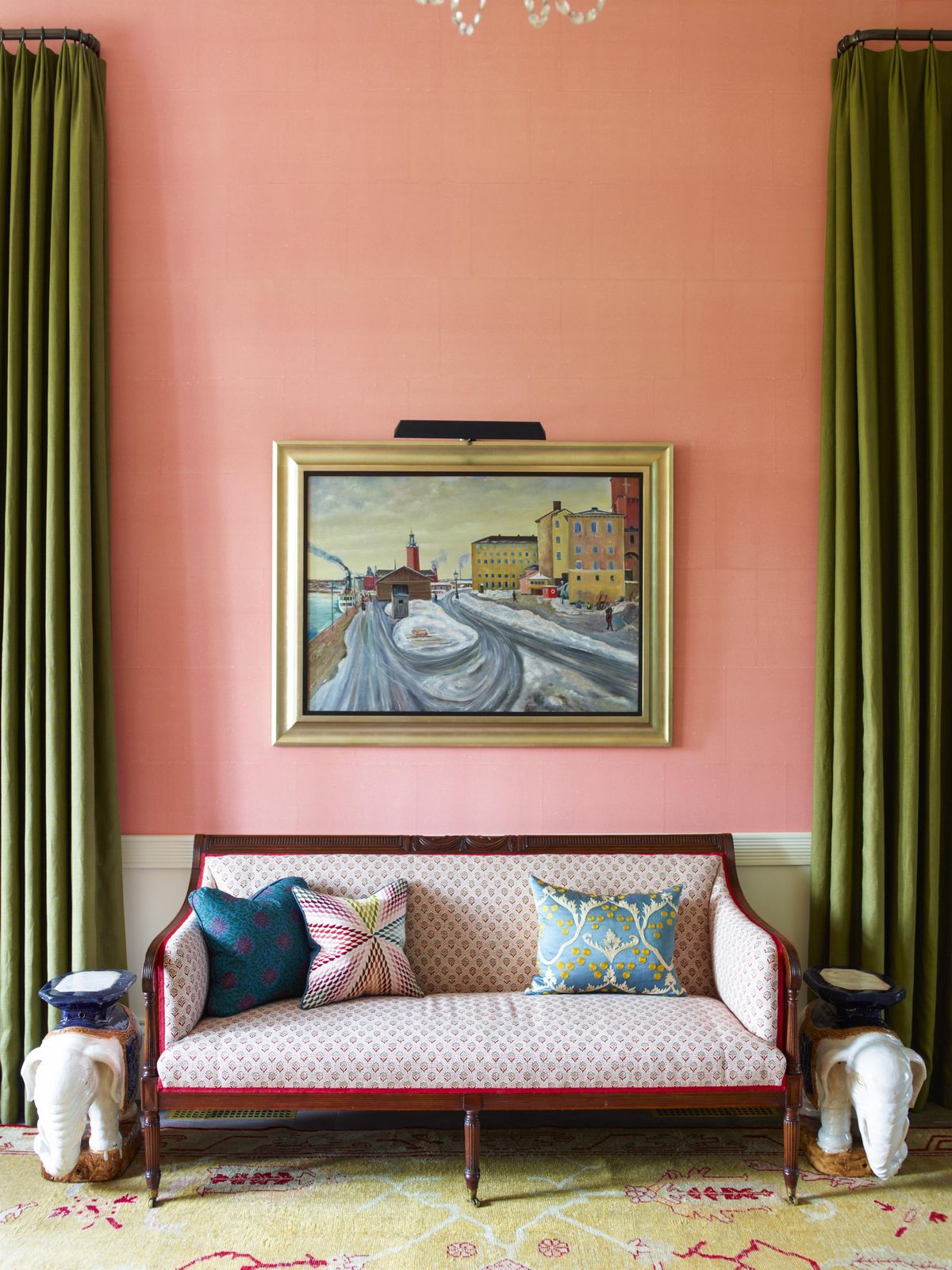 Katie Ridder and Peter Pennoyer’s living room walls are covered in pale-pink de Gournay tea paper. (Eric Piasecki)
