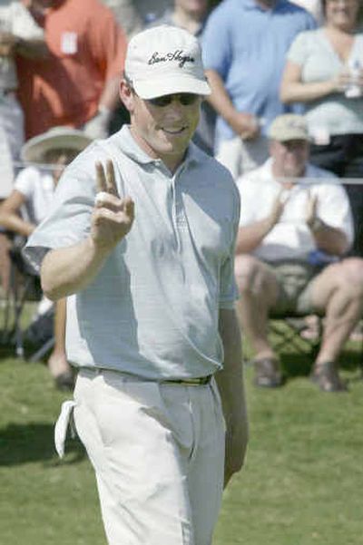 
Co-leader Justin Leonard acknowledges the gallery after putting for birdie on the 16th at the Colonial.Co-leader Justin Leonard acknowledges the gallery after putting for birdie on the 16th at the Colonial.
 (Associated PressAssociated Press / The Spokesman-Review)