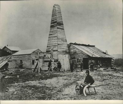 The world's first commercially successful oil well is shown in the historic photo above. The well was completed at Titusville, Pa on August 27, 1859, by Colonel Edwin L Drake and the event marked the birth of the oil industry. Drake's success ushered in a new era of social and economic advancement for the world. (BBDO News Bureau)