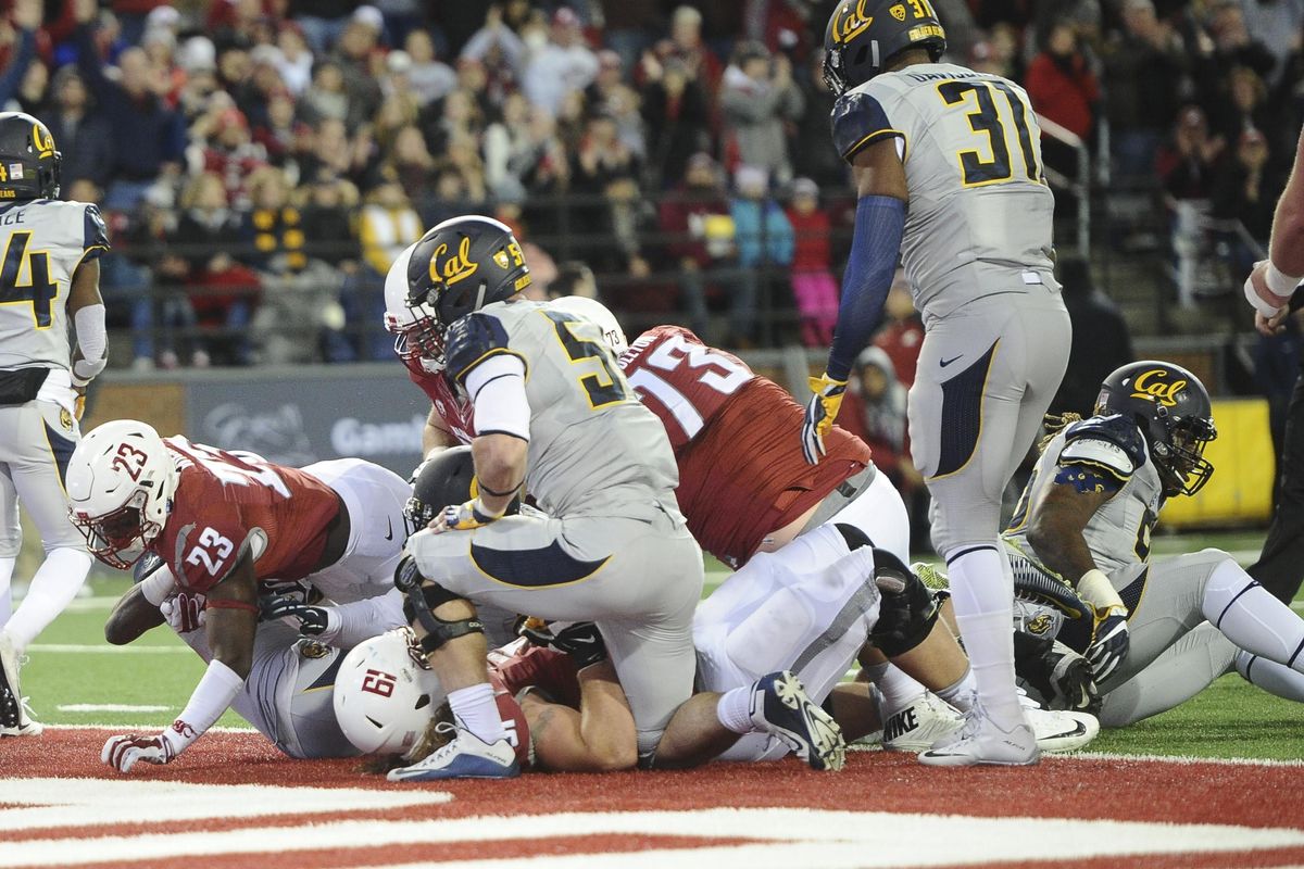 Washington State running back Gerard Wicks sneaks across for a touchdown in the first quarter against Cal in the Pac-12 game in Pullman on Saturday. (Tyler Tjomsland / The Spokesman-Review)