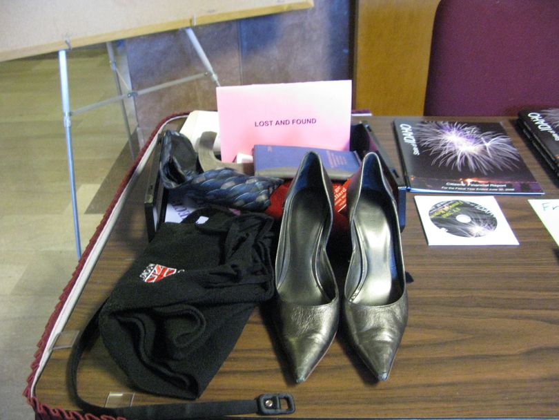 The collection of lost-and-found items in the Capitol Annex has been growing all session, and on Monday, oddly, included a pair of women's silver spike-heeled pumps. (Betsy Russell / The Spokesman-Review)