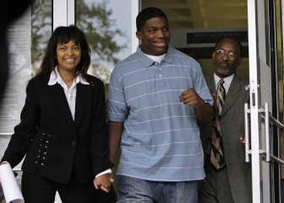 
Mychal Bell, one of the Jena 6, walks with his attorneys Carol Powell Lexing and Louis Scott as they leave LaSalle Parish Courthouse in Jena, La., Thursday. Associated Press
 (Associated Press / The Spokesman-Review)