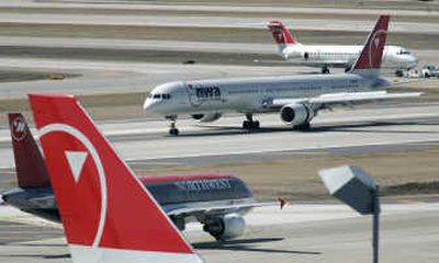
Delta and Northwest announced a deal Monday that would create the world's biggest airline carrier.Associated Press
 (Associated Press / The Spokesman-Review)