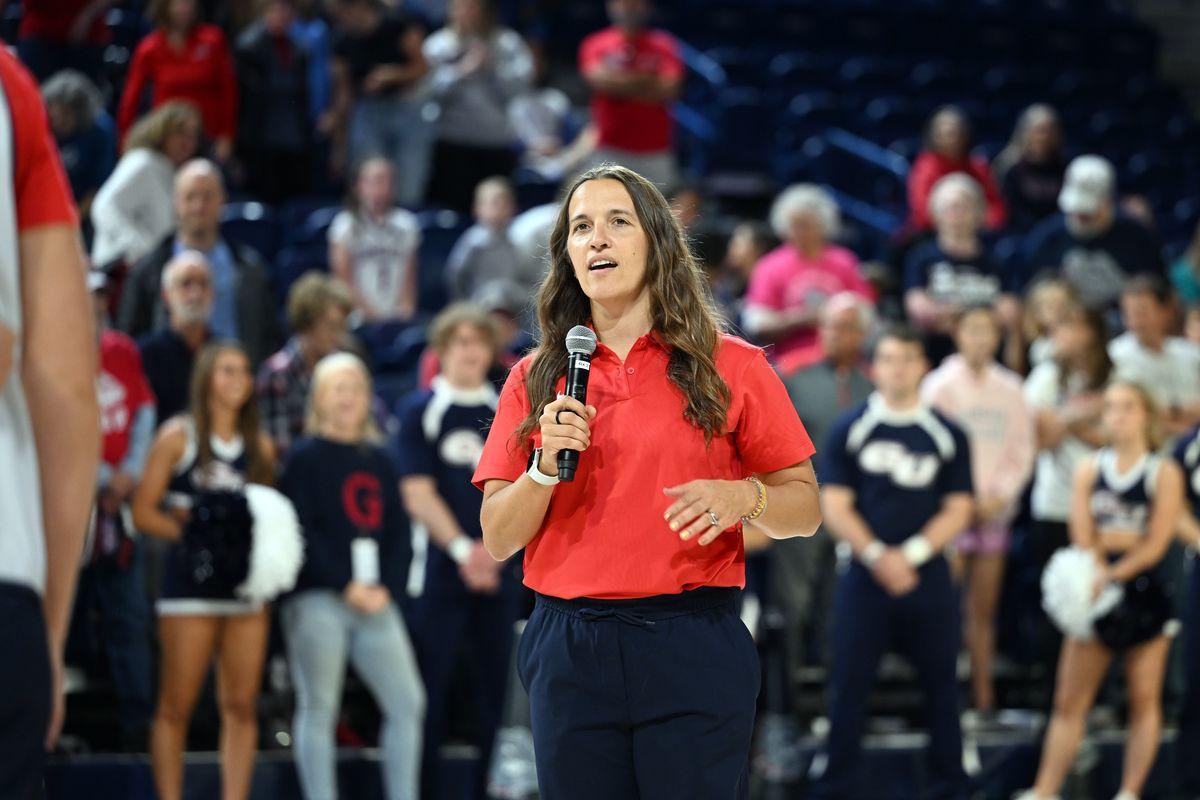 Gonzaga women’s basketball head coach Lisa Fortier speaks to the crowd Saturday after she was introduced on the court at FanFest. Fortier’s Bulldogs, favored to win the West Coast Conference, are loaded with returners for the 2023-24 season.  (Jesse Tinsley/THE SPOKESMAN-REVIEW)