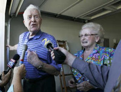 
Paul Henss, 85, addresses reporters' questions as his wife, Else, stands at his side at their home Monday in Lawrenceville, Ga. Associated Press
 (Associated Press / The Spokesman-Review)