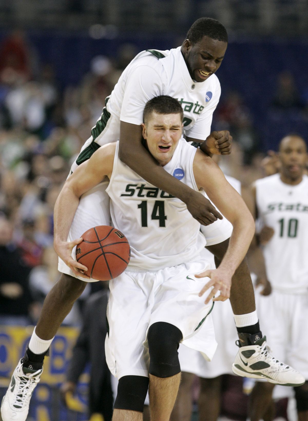 Michigan State’s Draymond Green, rear, and Goran Suton are riding high in the Elite Eight.  (Associated Press / The Spokesman-Review)