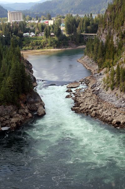 Photo shows town of Metaline Falls and namesake rapids on Pend Oreille River. (Photo by Peter Clarke)