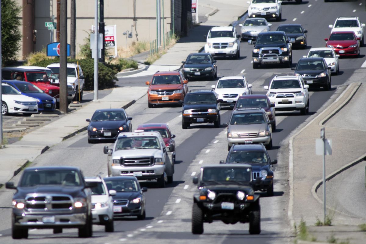 Cars and trucks, and the fumes from the gasoline that powers most of them, contribute to the formation of ozone in the local atmosphere, expecially when the temperatures soar into the 90s in the summer time. Ozone is component of unhealthy air and can cause lung irritation.  Photographed on Division Street Friday, July 7, 2017.  Jesse Tinsley/THE SPOKESMAN-REVIEW (Jesse Tinsley / The Spokesman-Review)