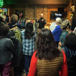 Eric Neufeld from the Simms Fishing Company explains wader fabrics for more than 30 ladies gathered for the first Women's at Silver Bow Fly shop.   (Sean Visintainer / Silver Bow Fly Shop)