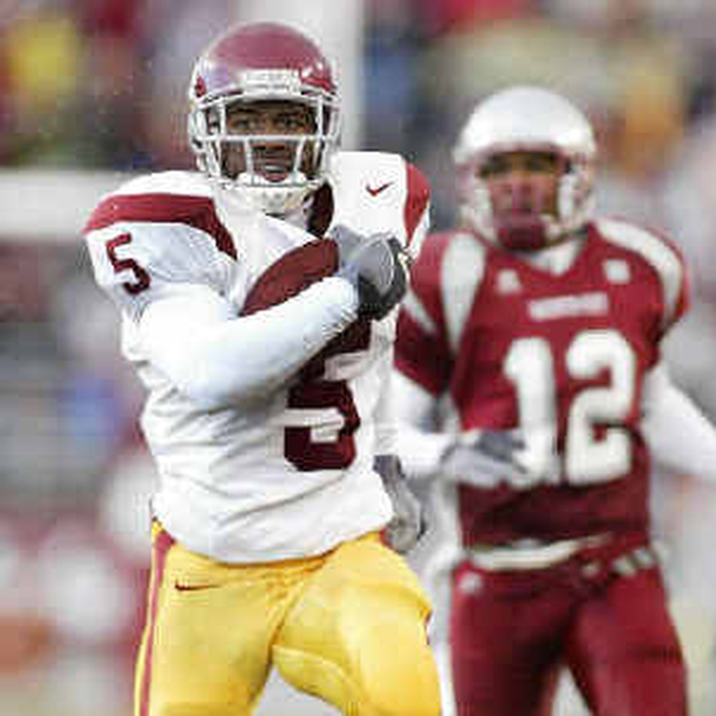 Sports Moments on X: USC running back Reggie Bush jump over UCLA