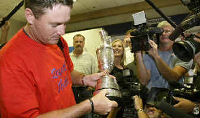 
British Open champion Todd Hamilton points to his name on the silver Claret Jug. 
 (Associated Press / The Spokesman-Review)
