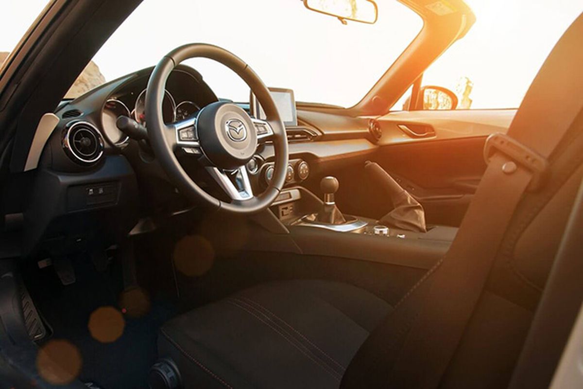 Owners who plan to put their Miata through its paces will want to order the available Recaro sport seats. Contoured to provide lasting support, the deeply bolstered Recaros held us firmly in place during spirited two-lane sessions. (Miata)