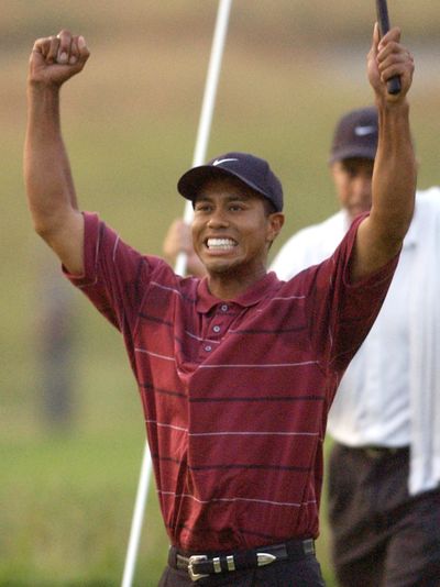 Tiger Woods celebrates his U.S. Open Golf Championship at Bethpage in 2002.  (File Associated Press / The Spokesman-Review)