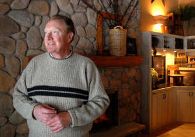 
Richard Brown, former anchor at KXLY in Spokane, stands in the living room in the South Hill home he shares with his wife. 
 (Jesse Tinsley / The Spokesman-Review)