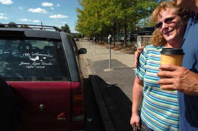 
Susan Nichols is comforted outside the Spokane County Courthouse on Friday. 
 (Dan Pelle / The Spokesman-Review)