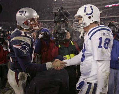
Patriots' Tom Brady, left, and Colts' Peyton Manning will meet again. Associated Press
 (Associated Press / The Spokesman-Review)