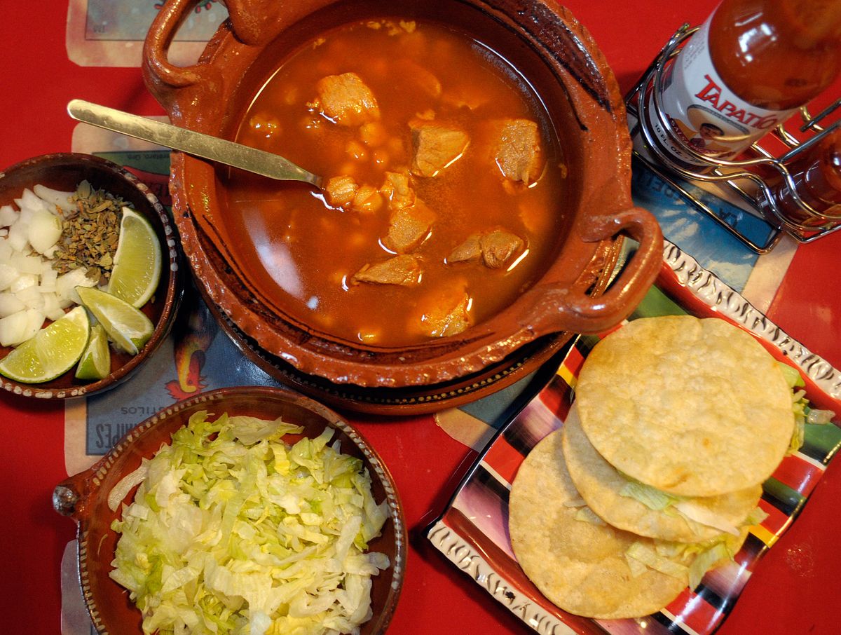 The mix of flavors and textures found in a bowl of pozole at El Gallo Giro on Sprague Avenue in Spokane can prove quite tempting.  (Photos by Christopher Anderson / The Spokesman-Review)