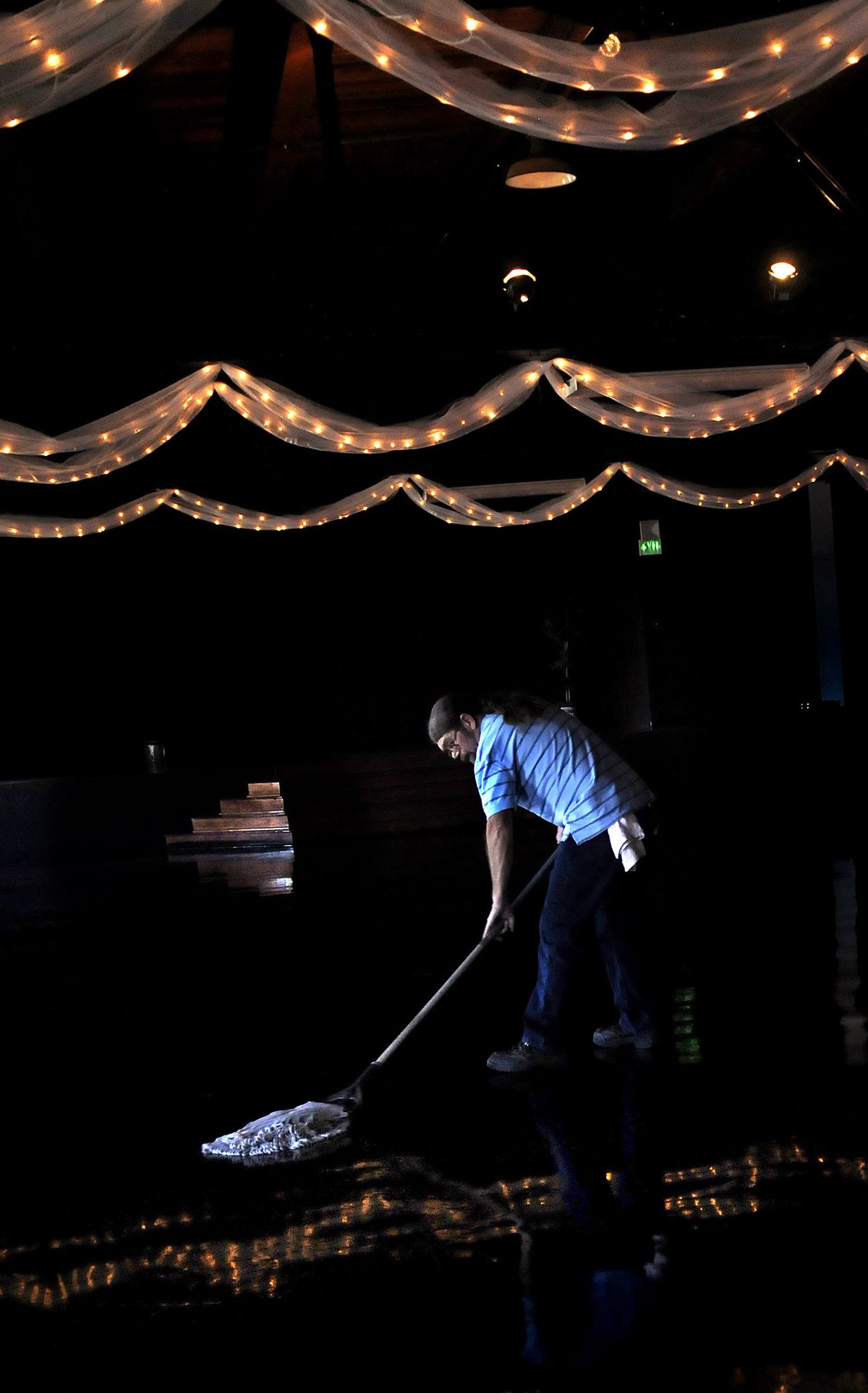 Spokane resident John Grant, 56, mops the floor at the Masonic Center in Spokane last week. Hit hard by the recession, Grant took a part-time janitorial position at the center. He estimates he’s filled out at least 150 job applications in the last nine months. He doesn’t think he’ll ever be able to retire.kathypl@spokesman.com (Kathy Plonka / The Spokesman-Review)