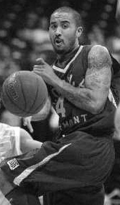 
Loyola Marymount's Adoyah Miller passes across the lane while driving against San Diego. 
 (Associated Press / The Spokesman-Review)