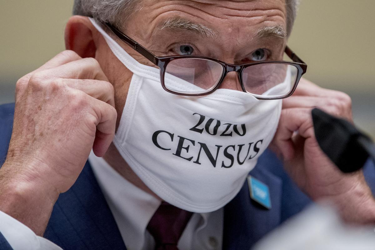 Census Bureau Director Steven Dillingham wears a mask with the words "2020 Census" as he arrives to testify before a House Committee on Oversight and Reform hearing on the 2020 Census on Capitol Hill, Wednesday, July 29, 2020, in Washington. (Andrew Harnik)